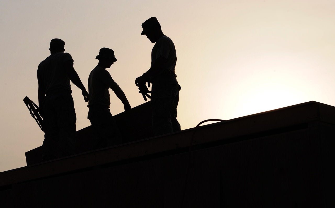 men preparing, met at work, three men